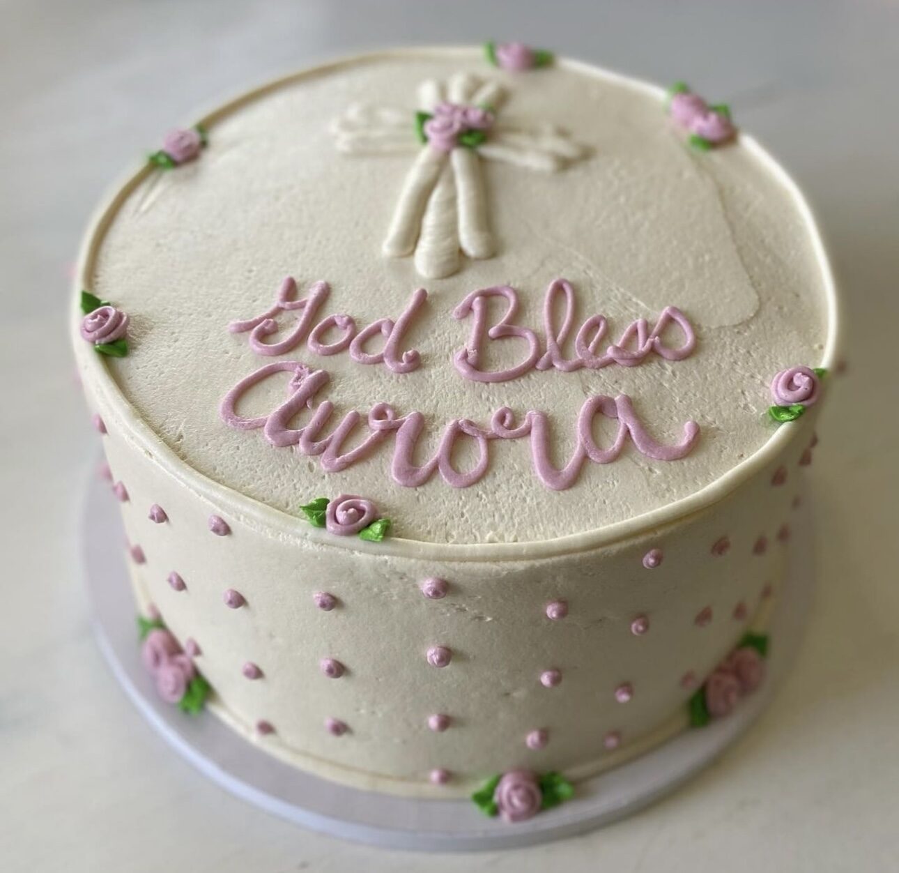 A cake hand-lettered with a celebration message