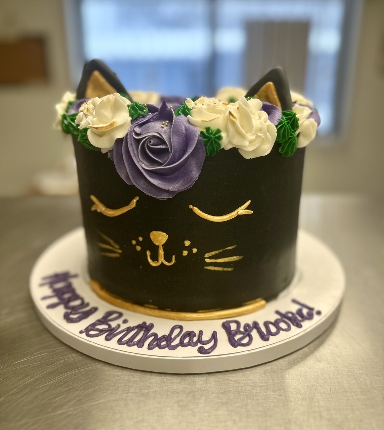 A custom novelty cake shaped and decorated by hand