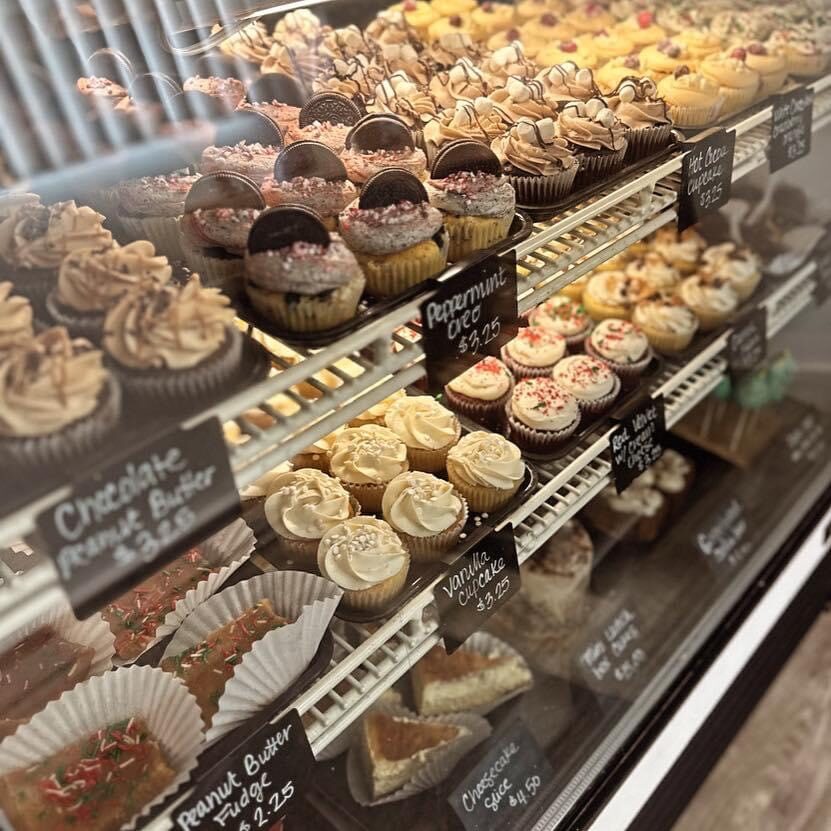 A bakery case filled with an assortment of treats